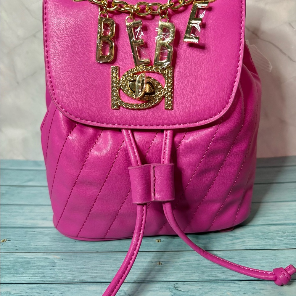 Bebe Fuchsia Quilted Backpack with Gold Accents